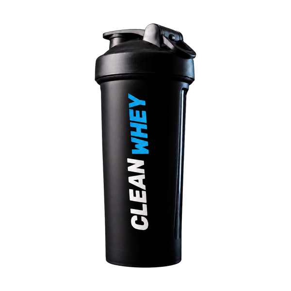 A matte black shaker bottle with a matching black lid, featuring the text 'CLEAN WHEY' printed vertically on the side in white and bright blue. The bottle is set against a dark blue gradient background on a dark, textured surface.